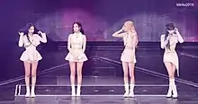 Blackpink standing onstage