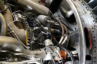 General Electric GE90 shows one of two locations (45 degrees either side of top centre) on fan frame where engine thrust is transferred by links to the rear thrust mount for transfer to the aircraft pylon.