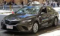 Toyota Camry Hybrid operated by TriColor Taxis