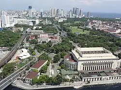 The skyline of Ermita with the Manila Central Post Office and Intramuros in the foreground