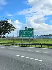 PR-22 east at exit 11 to PR-5 and PR-869 north between Bayamón and Cataño
