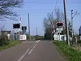 A half-barrier level crossing known as an AHBC near Waterbeach, Cambridgeshire