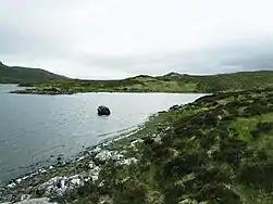 Bay below Creagan Mòr, Loch Veyatie. This sheltered bay was most welcome by a group of anglers on a rather windy day. At the inner end of the bay is the small beach