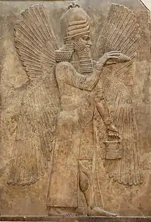 Deity representation on Assyrian relief. Blessing genie, about 716&nbsp;BCE. Relief from the palace of Sargon II. Louvre AO&nbsp;19865