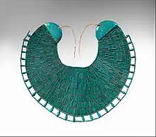 Broad collar of Wah; 1981–1975 BC; faience and linen thread; height: 34.5&nbsp;cm, width: 39&nbsp;cm; Metropolitan Museum of Art (New York City)