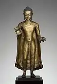 Gupta sculpture of Buddha offering protection; late 6th–early 7th century; copper alloy; height: 47&nbsp;cm, width: 15.6&nbsp;cm, diameter: 14.3&nbsp;cm; from India (probably Bihar); Metropolitan Museum of Art