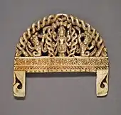 Comb with Vishnu adored by serpents; 1750–1800; ivory with traces of paint; 6.99 by 7.94 centimetres (2.75&nbsp;in ×&nbsp;3.13&nbsp;in); from Nepal; Los Angeles County Museum of Art
