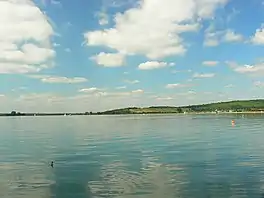 A lowland lake with pleasure craft on it