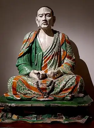 Statue of the luohan Tamrabhadra, one of the group of glazed pottery luohans from Yixian; 10th–13th century; glazed terracotta; height: 123&nbsp;cm; Guimet Museum (Paris)