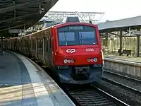 An urban service train leaving Track 2 of Sete Rios Station, July 2008