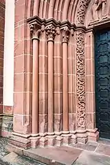 Slender Gothic columns at a portal of Marienkirche Gelnhausen&nbsp;[de] (Gelnhausen, Germany)