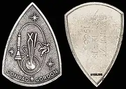 Gemini 11 mission emblem and crew names (front). Flight dates (back)