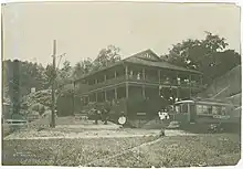 Excursion train to the Glenwood Inn. The banner on the trolley says "Concert at Glenwood". Trolley is stopped (end of route) before starting back to Hornellsville. Note that the car is smaller: only 6, rather than 8, windows on each side.