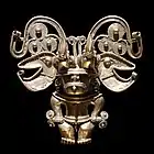 Anthropomorphic pendant; 18th century; gold; height: 13&nbsp;cm (5.1&nbsp;in), width: 13&nbsp;cm (5.1&nbsp;in), depth: 4.5&nbsp;cm (1.7&nbsp;in); Musée du Quai Branly (Paris)