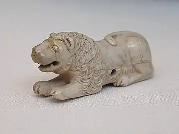 Old Kingdom gaming piece of ivory. Set of 6, 3 lions, and 3 bulldogs; Abu Rouash, Tomb M, 1st Dynasty, 3.5 × 6.5&nbsp;cm, Cairo Museum