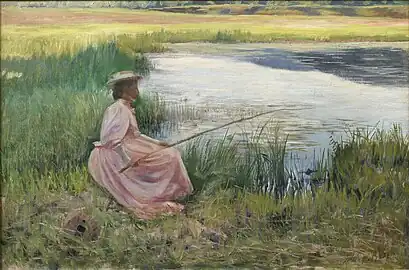Young Woman Fishing Along a River