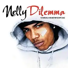 Nelly is seen wearing tape under his left eye, and a white hood that blends in with the white background. The song title and artist are displayed above him.