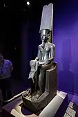 Statue of Amun; 1336-1327 BC; height: 220&nbsp;cm (87&nbsp;in), width: 44[clarification needed], length: 78&nbsp;cm (31&nbsp;in); Louvre
