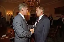 President Bill Clinton and Carnahan shaking hands in 1993