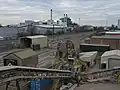 Rail unloading facilities at Hayes Tarmac works; the old Nestlé factory is in the background (2011)