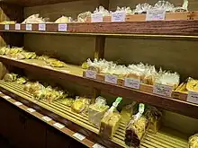 Photograph of shelves displaying various baked goods