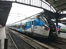 Régiolis in "Fluo Grand Est" livery at Paris-Est.