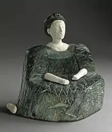 Female figurine of the "Bactrian princess" type; 2500–1500; chlorite (dress and headdresses) and limestone (head, hands and a leg); height: 13.33&nbsp;cm; Los Angeles County Museum of Art (USA)