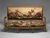 Louis XVI settee; designed in circa 1786, woven 1790–91, settee frame from the second half 19th century; carved and gilded wood, with wool and silk; 107.3 × 191.5 × 71.1&nbsp;cm; Metropolitan Museum of Art