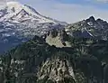 Mt. Rainier, Double Peak (centered), and the Cowlitz Chimneys (right) seen from Shriner Peak.