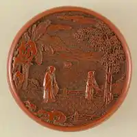 He (Small Box) with Elderly Woman and Young Boy Tending Bamboo in a Garden. Qing, Qianlong. Note the three kinds of brocade-ground.