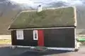 Small house with turf roofPhoto: Erik Christensen