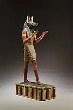 Statuette of Anubis; 332–30&nbsp;BC; plastered and painted wood; 42.3&nbsp;cm; Metropolitan Museum of Art (New York City)