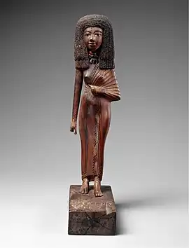 Statuette of the lady Tiye; 1390–1349&nbsp;BC; wood, carnelian, gold, glass, Egyptian blue and paint; height: 24&nbsp;cm; Metropolitan Museum of Art (New York City)