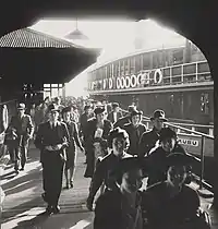 Max Dupain photograph of passengers alighting Kubu at Circular Quay, 1938