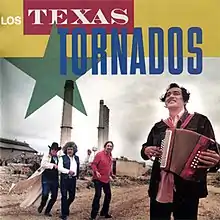 Texas Tornados playing music with a tornado in the background.