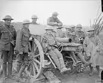 Gunners of the Royal Marine Artillery by a captured German 105&nbsp;mm FH 98/09 field howitzer during the Battle of Arras, April 1917.