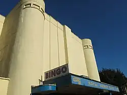 streamlined white building with a bingo hall sign