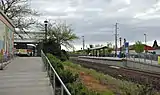 View from the walkway connecting the transit center's bus facility with the rail platform
