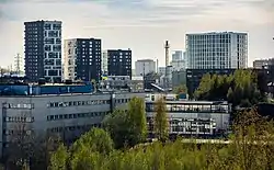 Highrises in Herttoniemi as seen from the water tower hill in Roihuvuori in May 2022