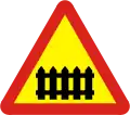 Railway crossing with gate or barrier