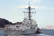 Flight IIA ship USS&nbsp;Mustin without TACTAS and no Harpoon launchers, but with helicopter hangars and new exhaust stacks design