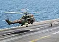 A French Navy AS565 Panther lands on the US aircraft carrier USS George Washington