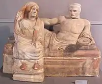 A funerary urn with sculpture of a couple, from Bottarone, alabaster, early 4th century BC